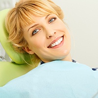 Woman using dental insurance at dentist in Bellingham