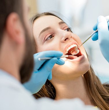 Patient in Bellingham smiling after a routine oral cancer screening