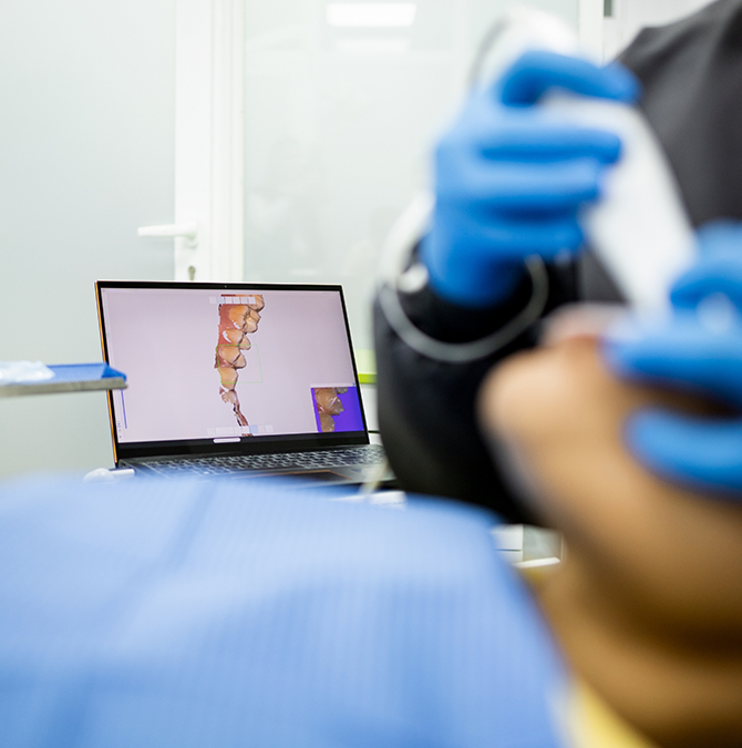 Dental patient getting digital impressions of their teeth taken