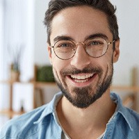 a man smiling with all-on-4 dental implants in Bellingham