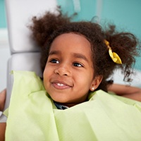 Little girl smiling in dental chair