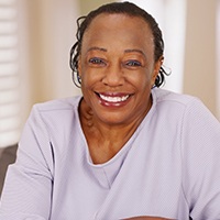 Smiling woman with dentures in Bellingham