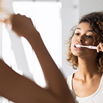 a person brushing their teeth