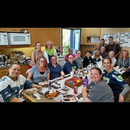 Team and patients eating food