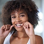 woman flossing 