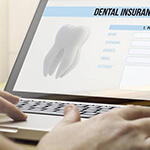 dental insurance forms on a laptop