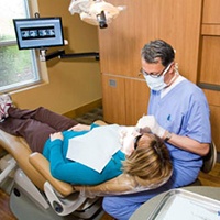 Dr. Moreno completing dental exam