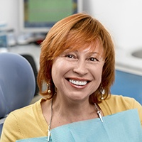 Smiling woman in dental chair