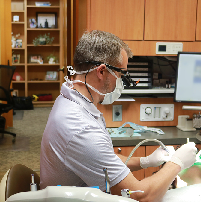 Doctor Young treating a dental patient