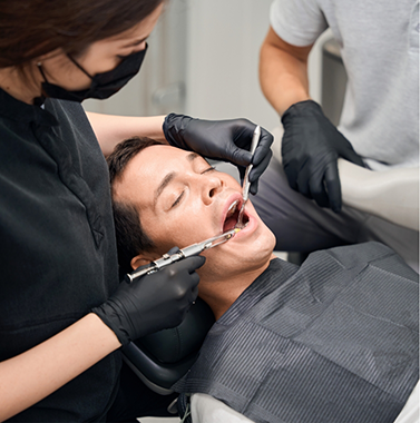 Man undergoing a dental procedure