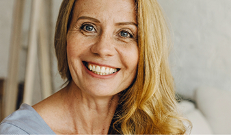 Smiling older blonde woman