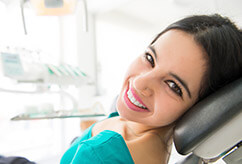 Smiling woman in dental chair