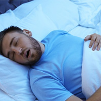 Man snores