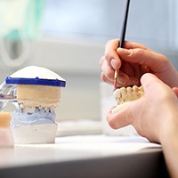 model being crafted in dental lab
