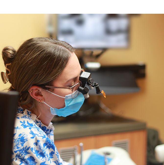 Doctor Montileaux treating a dental patient