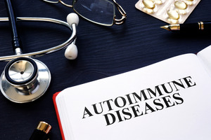 Book that says “Autoimmune Disease” next to medical equipment
