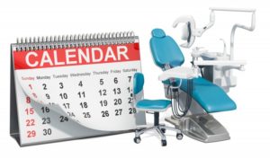 calendar next to a dental chair