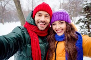 Couple enjoying time outdoors during winter 