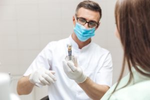 dentist discussing dental implants in Bellingham during a consultation.